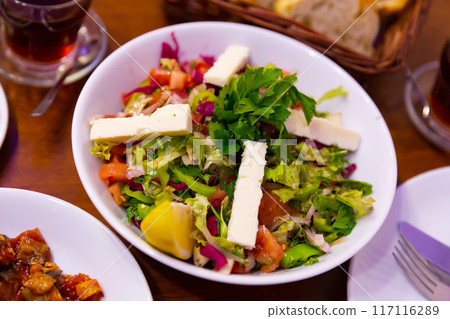Image of Choban salad with cheese in a Turkish cafe. 117116289