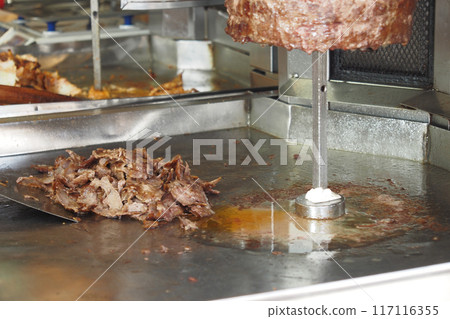 rotating traditional gyros meat close up rotating traditional gyros meat close up 117116355