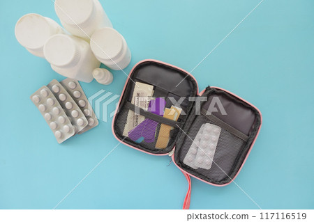 adhesive bandage and a bag on table  117116519