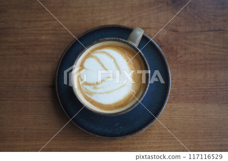 Coffee cup on wood table  117116529