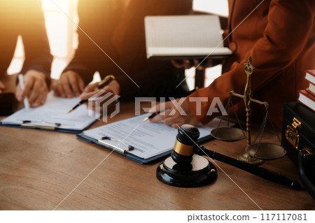 Lawyer, legal advisor, businessman brainstorming information on agreement details Business contracts in legal processing books for accuracy in contract documents. joint financial investment. Lawyer, legal advisor, businessman brainstorming information on agreement details Business contracts in legal processing books for accuracy in contract documents. joint financial investment. 117117081