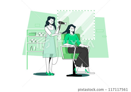 Hairdresser dry a new hairstyle for a customer at a hair salon. 117117561