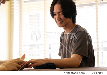 Men's nail care treatment 117117890