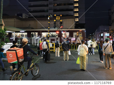 Hankyu Kobe Line Tsukaguchi Station Nearby Railroad Crossing at Night Hankyu Kobe Line Tsukaguchi Station Nearby Railroad Crossing at Night 117118769