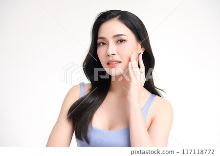 Beautiful young asian woman with clean fresh skin on white background, Face care, Facial treatment, Cosmetology, beauty and spa, Asian women portrait. Beautiful young asian woman with clean fresh skin on white background, Face care, Facial treatment, Cosmetology, beauty and spa, Asian women portrait. 117118772