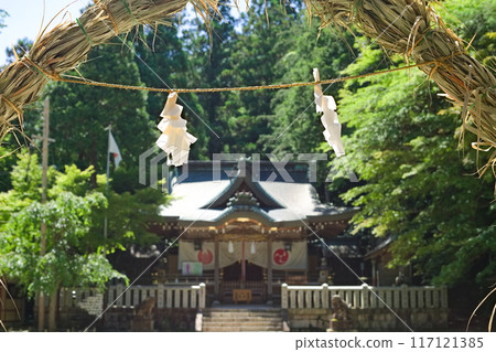A quiet shrine surrounded by trees A quiet shrine surrounded by trees 117121385