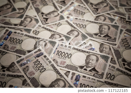 Japan's new 10,000 yen note. A negative image of a large number of 10,000 yen notes piled up. Japan's new 10,000 yen note. A negative image of a large number of 10,000 yen notes piled up. 117122185