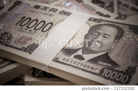 Japan's new 10,000 yen note. A negative image of one million yen tied together with a sash Japan's new 10,000 yen note. A negative image of one million yen tied together with a sash 117122202
