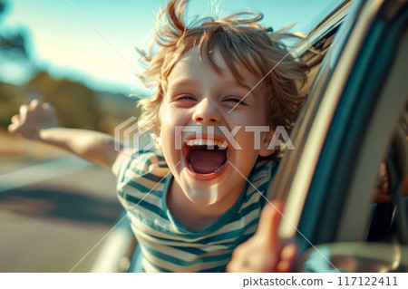 Little boy that is sitting in car with his mouth wide open. 117122411