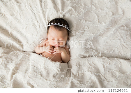 Cute newborn baby sleeping soundly 117124951