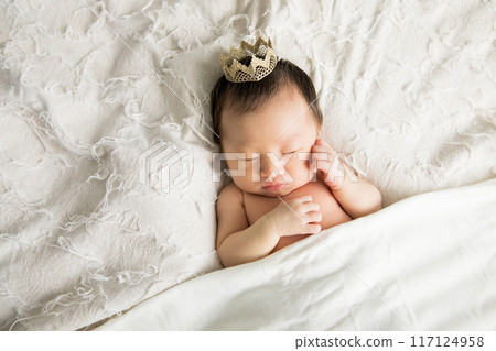 Cute newborn baby sleeping soundly 117124958
