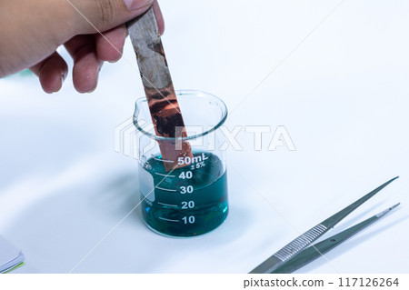 Electroplating experiment in chemistry laboratory. Electroplating experiment in chemistry laboratory. 117126264
