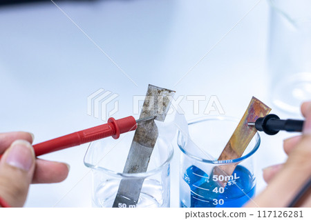 Electroplating experiment in chemistry laboratory. Electroplating experiment in chemistry laboratory. 117126281