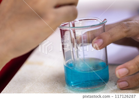 Electroplating experiment in chemistry laboratory. 117126287