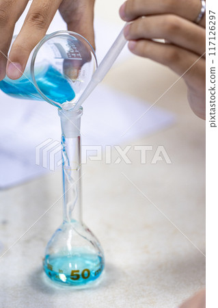 Electroplating experiment in chemistry laboratory. Electroplating experiment in chemistry laboratory. 117126297