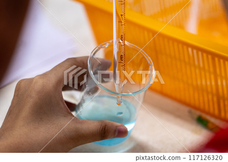 Electroplating experiment in chemistry laboratory. 117126320