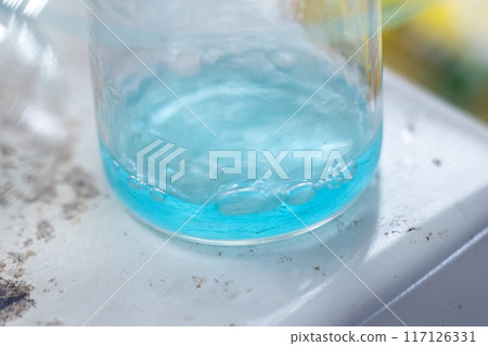 Electroplating experiment in chemistry laboratory. Electroplating experiment in chemistry laboratory. 117126331