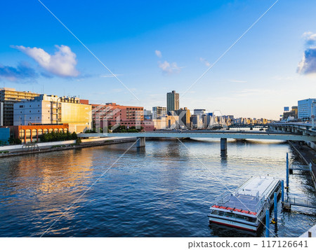 Sumida River illuminated by the summer morning sun Sumida River illuminated by the summer morning sun 117126641