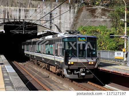 Fukuchiyama Line 223 series train departing Takedao Station 117127197