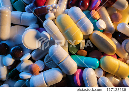 Multicolored Capsules Or Vitamins, Oral Pills And Side Effects. Pharmaceutical Multicolored Capsules Or Vitamins, Oral Pills And Side Effects. Pharmaceutical 117128386