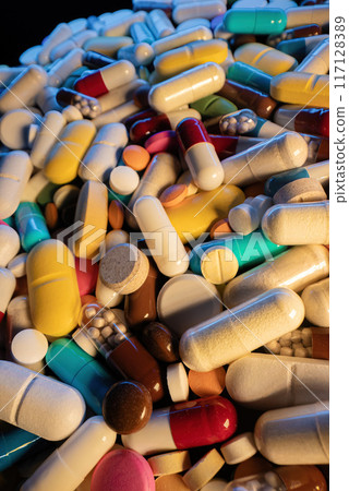 Colorful Drugs, Antibiotic Capsules. Cure Flu Medication. Macro View Of Tablets Colorful Drugs, Antibiotic Capsules. Cure Flu Medication. Macro View Of Tablets 117128389