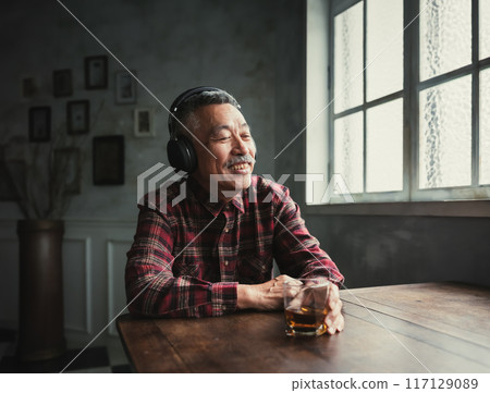 Drinking man 117129089