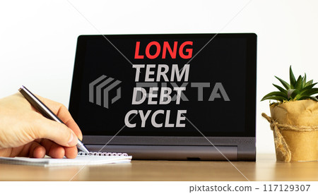 Long term debt cycle symbol. Concept words Long term debt cycle on beautiful black tablet. Beautiful white background. Businessman hand. Calculator. Business Long term debt cycle concept. Copy space. 117129307