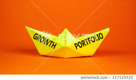Growth portfolio symbol. Concept words Growth portfolio on beautiful yellow paper boat. Beautiful orange paper background. Business Growth portfolio concept. Copy space. 117129329