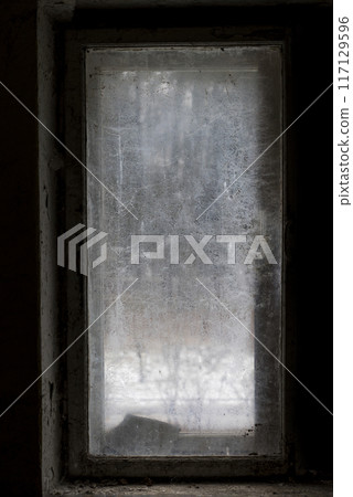 Old abandoned building. Old windows. Abandoned hotel.  Horror concept. window silhouette 117129596