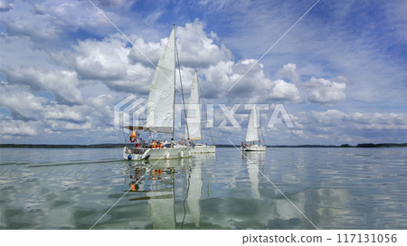 View of three yachts compete in team sailing event.August 3, 2024. Belarus, Zaslavskoye Reservoir 117131056