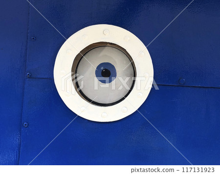 An eye in a round porthole 117131923