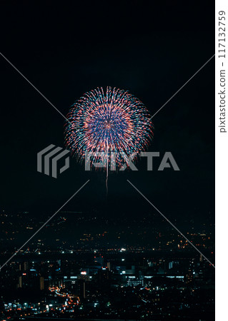 Fireworks dancing in the night sky 117132759