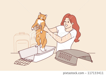 Animal cage for traveling with cat, near woman preparing pet for trip to airport Animal cage for traveling with cat, near woman preparing pet for trip to airport 117133411
