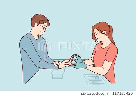 Woman does manicure for man who cares about nail hygiene and well-groomed hands. 117133420