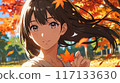 Beautiful woman with autumn leaves in the background 117133630