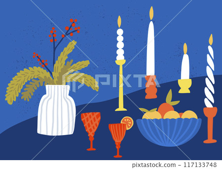 Winter holidays cozy table, candles and vase with christmas tree branches, tangerines, red glasses. 117133748