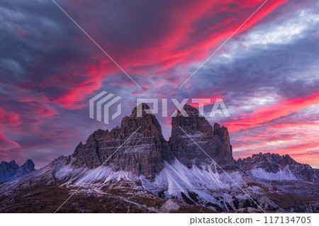 Incredible purple sunset at Three peaks of Lavaredo mountains Incredible purple sunset at Three peaks of Lavaredo mountains 117134705