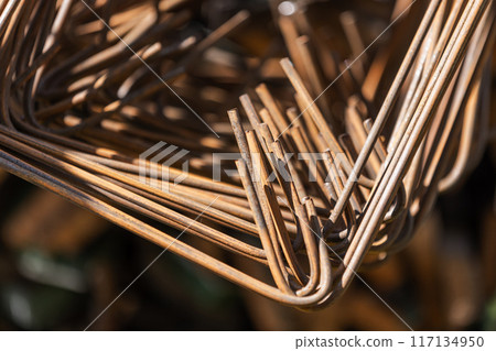 Rusty steel rods for reinforcement strapping, abstract background 117134950