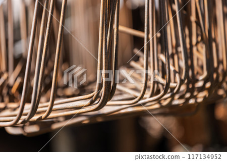 Rusty steel rods for reinforcement strapping, close-up photo 117134952