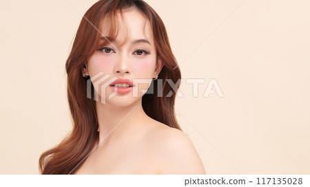 Beautiful young asian woman with clean fresh skin on beige background, Face care, Facial treatment, Cosmetology, beauty and spa, Asian women portrait. 117135028