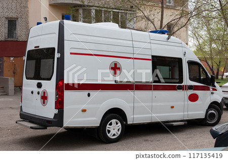 Ambulance at the entrance of the house 117135419