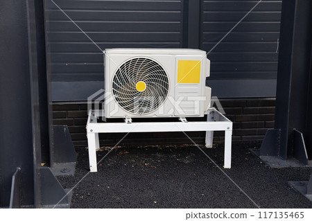 Outdoor split air conditioning units mounted on siding wall Outdoor split air conditioning units mounted on siding wall 117135465