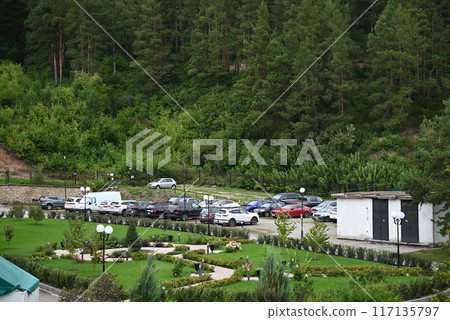 Cars standing in a quarry at dawn. Autotourism in the Mountains. 117135797