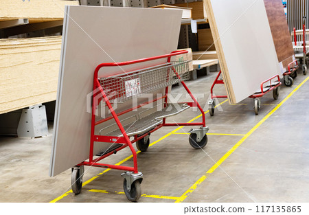 Fordable platform hand truck with cardboard box. goods sale. commerce, post box online shopping. Purchasing power, delivery order. E-commerce, sales and sale of goods through online trading platforms. Fordable platform hand truck with cardboard box. goods sale. commerce, post box online shopping. Purchasing power, delivery order. E-commerce, sales and sale of goods through online trading platforms. 117135865