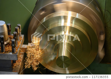Closeup scene the lathe machine finish cut the brass parts. 117136355