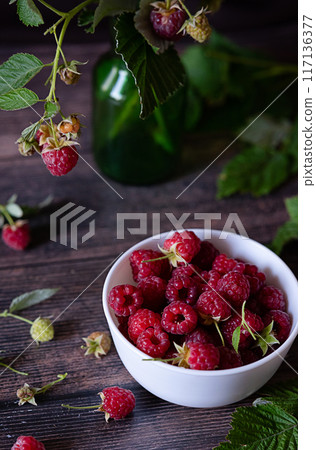 Fresh raspberries in bowl. Ripe juicy fresh raspberries. Organic raspberries, healthy food, vitamins, summer berry fruit. Long banner format. place for text. 117136377