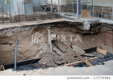 Monolithic reinforced concrete foundations or grillages for the construction of a large modern residential building. Rostverk at the construction site. Foundation for the building. View from above 117136464