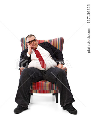 Businessman in black suit and red tie, in glasses sitting with serious face in armchair, having meeting with partners isolated on white background. Businessman in black suit and red tie, in glasses sitting with serious face in armchair, having meeting with partners isolated on white background. 117136823