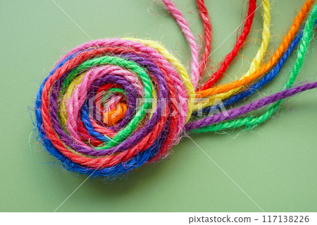 A ball of multi-colored threads. Unity and togetherness. A ball of multi-colored threads. Unity and togetherness. 117138226