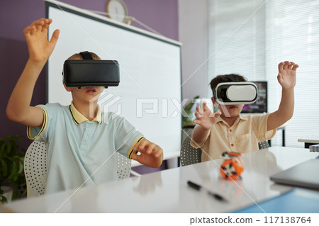 Children Experiencing Virtual Reality Performance in Classroom 117138764